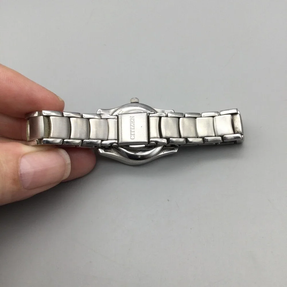 Citizen Eco-Drive WR 100 Womens Watch 25mm Black Dial Date Stainless Bracelet 6